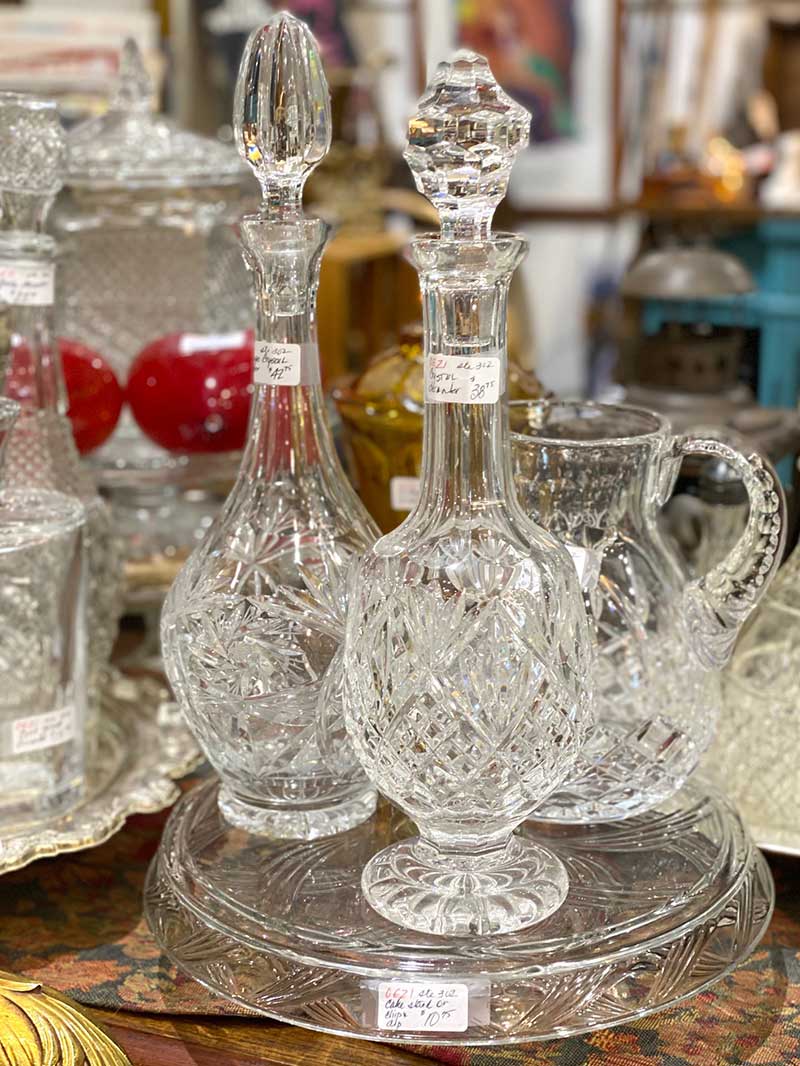 Vintage decanters and other crystal pieces available for sale at Frisco Mercantile