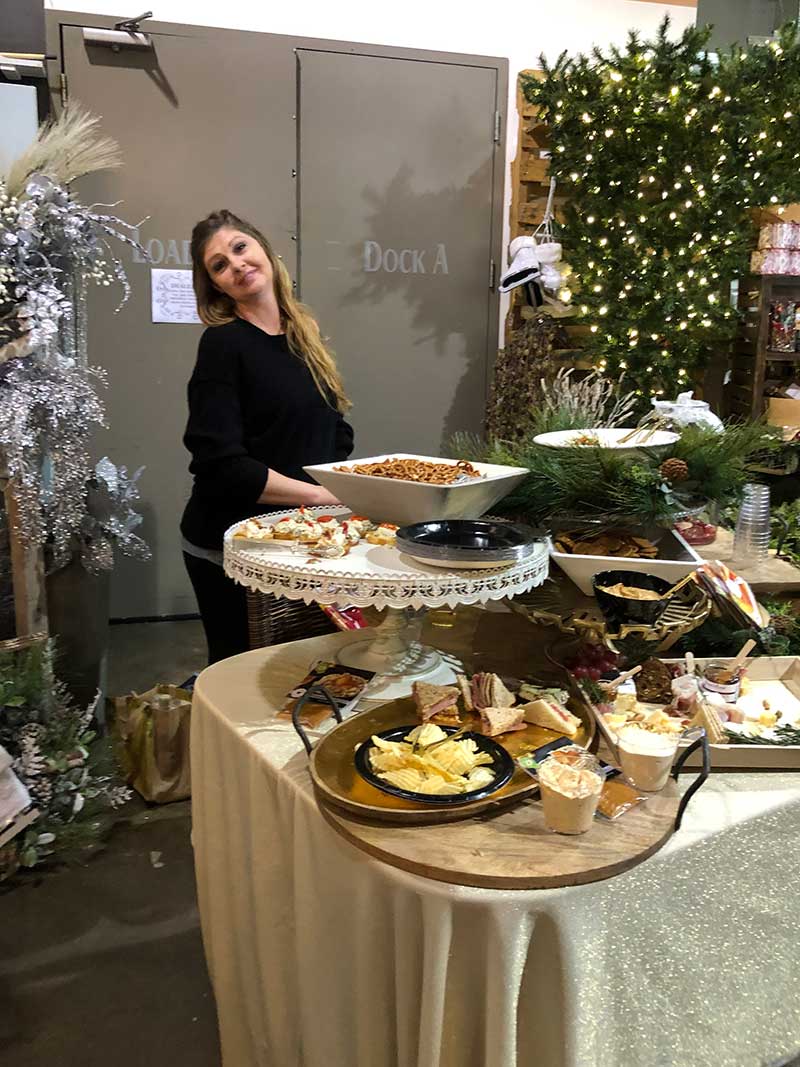 Ladies Night at Frisco Mercantile 10/21/2021 - Merchant serving at food station