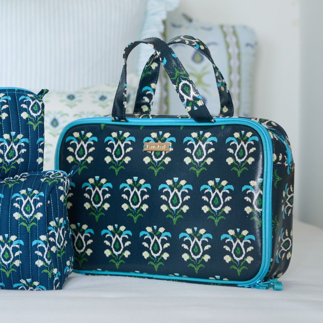 Rosemary Indigo Travel Case in indigo blue with blue, white, and green design