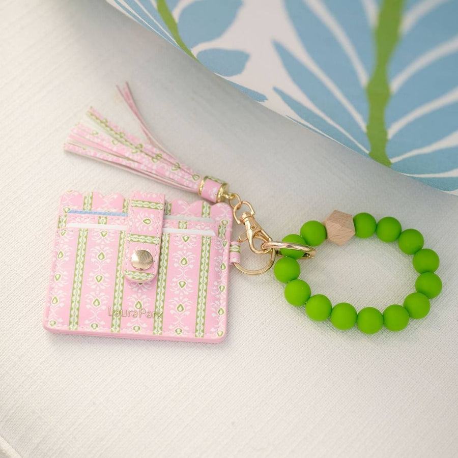Rosemary Stripe Pink Wristlet Wallet has a matching fringe tassel