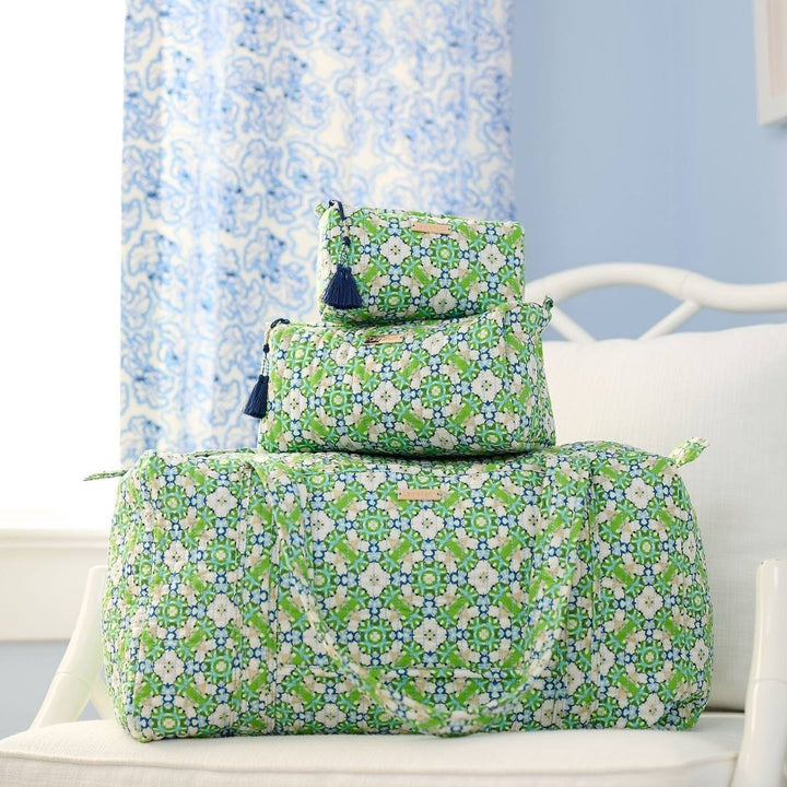 Serendipity Cosmetic Bag shown with signature quilted duffel bag