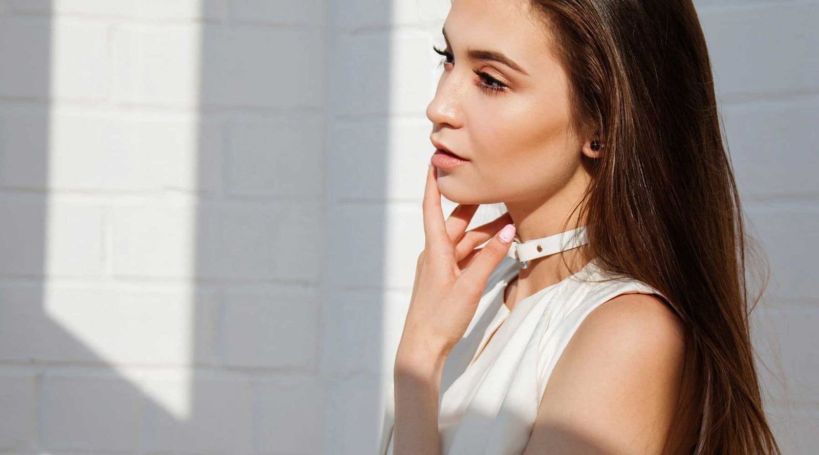 Woman thinking of frequently asked questions for Frisco Mercantile