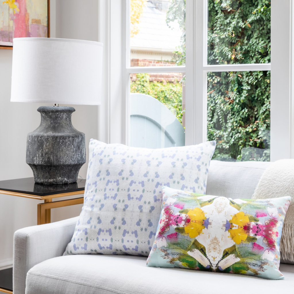 Poppy Blue Linen Cotton Pillow from Laura Park Designs in vivid colors, shown with Cheetah Lavender