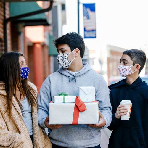 Candy Canes kid&#39;s face mask with red candy canes friends wearing masks with gifts