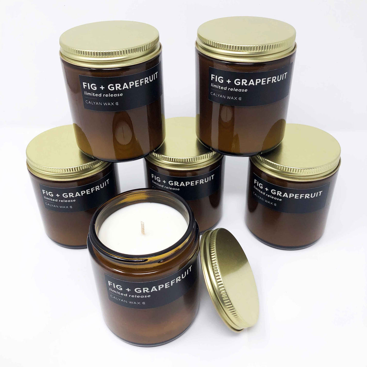 Fig + Grapefruit limited release fragrance candle in amber jar