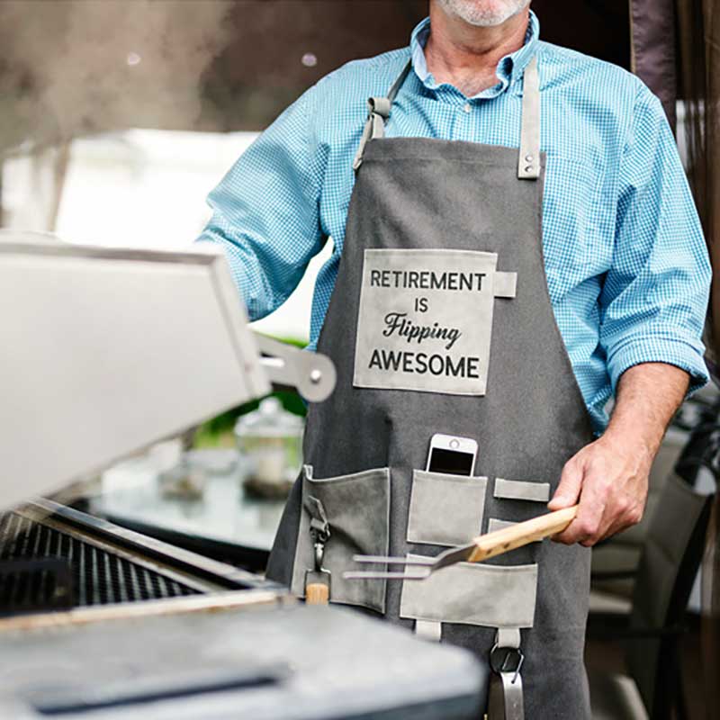 Retirement is Flipping Awesome grillng apron showing man at grill holding grill fork