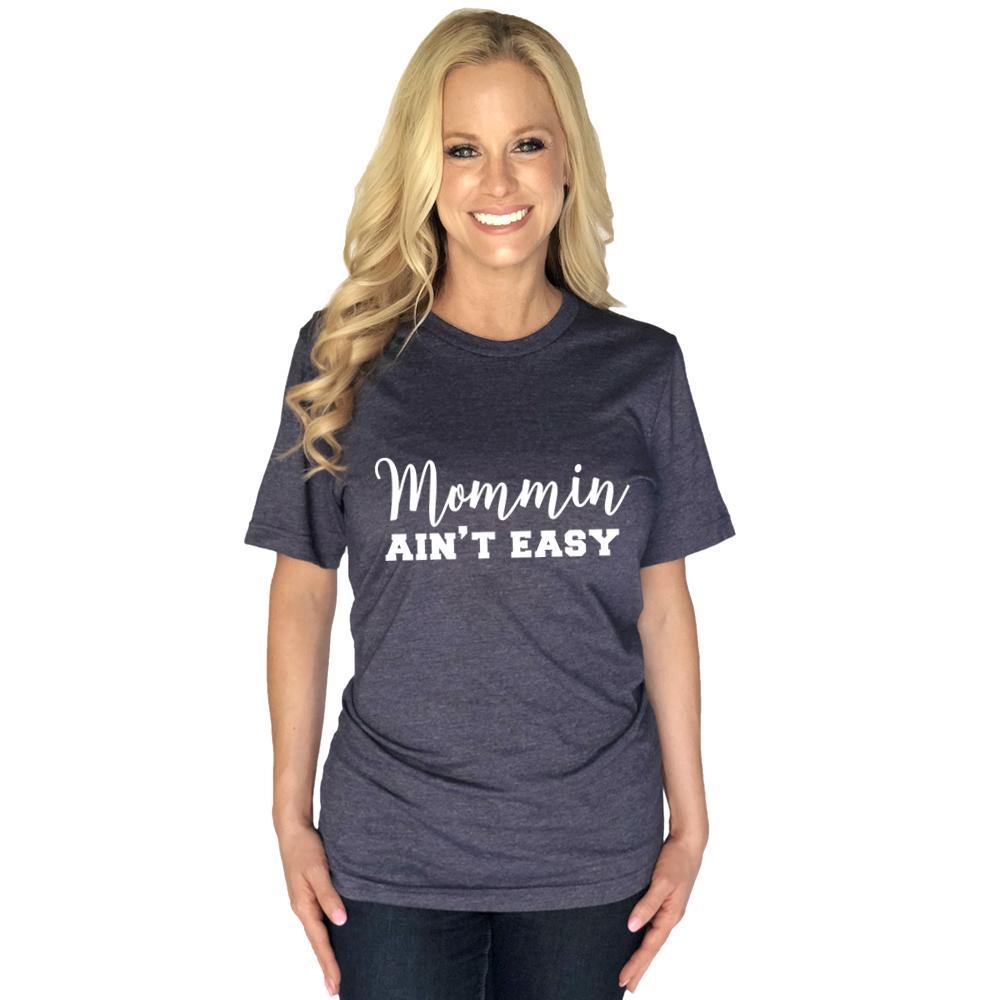 Mommin Ain&#39;t Easy women&#39;s t-shirt from Katydide with model wearing navy color