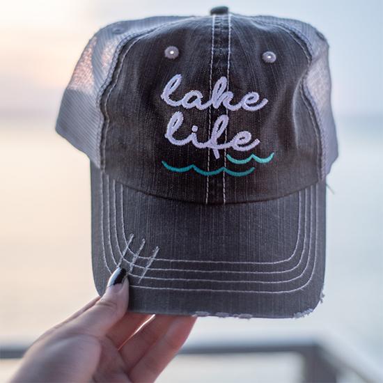 Lake Life trucker hat with embroidered message on gray cap
