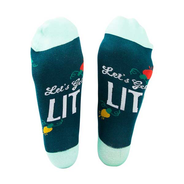 Let&#39;s Get Lit Holiday Socks and Ornament slogan on soles view
