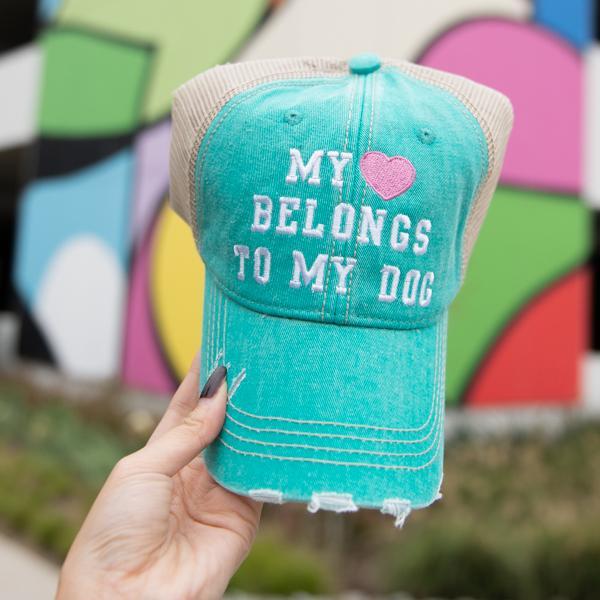 My Heart Belongs To My Dog women&#39;s trucker hat in teal from Katydid in models hand
