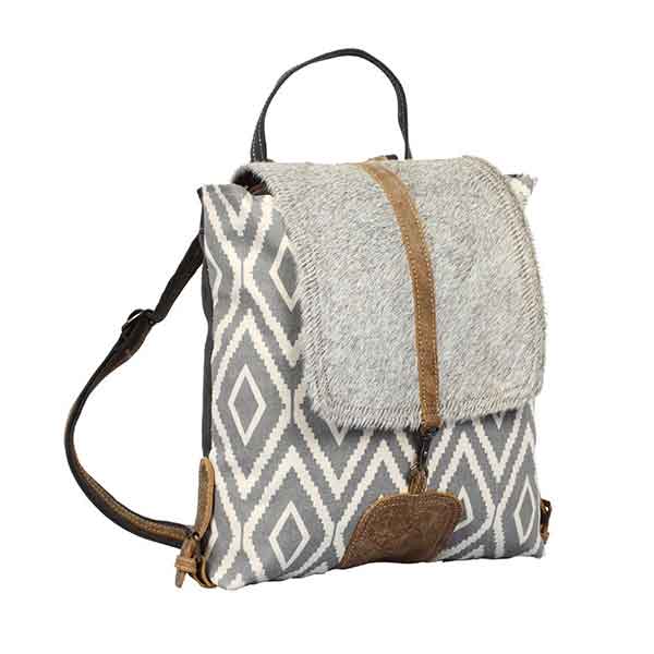 Artist Impression Backpack Bag of upcycled canvas with hairon flap from Myra Bag