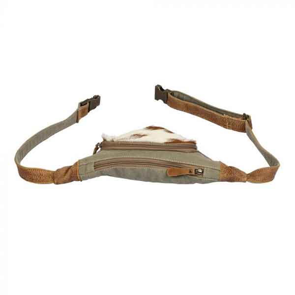 Olive colored fanny pack of canvas and hair-on leather from Myra Bag top view