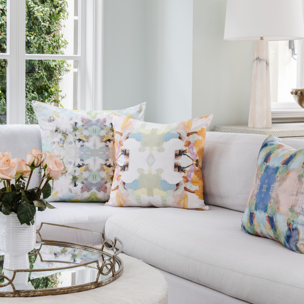 Orange Crush Linen Throw Pillow shown on sofa display