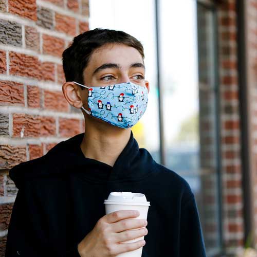 Penguins &amp; Lights kid&#39;s mask with Penguins wearing caps stringing Christmas lights boy in mask