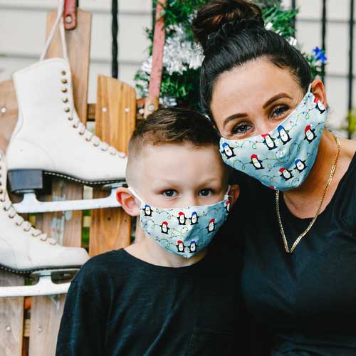 Penguins &amp; Lights kid&#39;s mask with Penguins wearing caps stringing Christmas lights mother and son