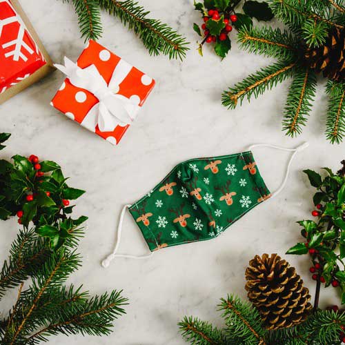 Reindeers &amp; Snowflakes kid&#39;s face mask red-nose reindeers and snowflakes mask under tree