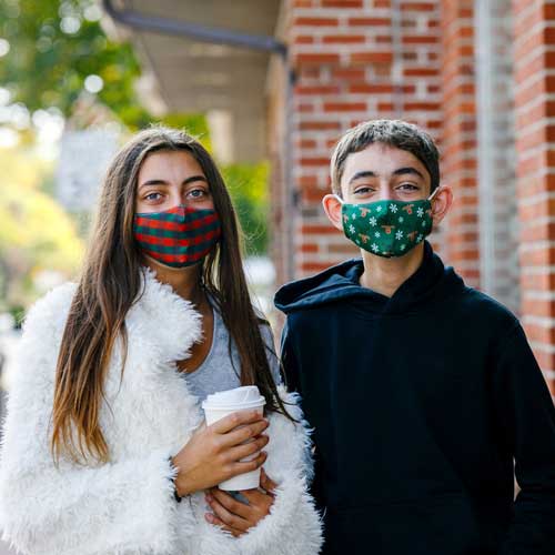 Reindeers &amp; Snowflakes kid&#39;s face mask red-nose reindeers and snowflakes siblings in masks