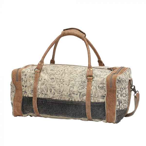 Floral print &amp; hairon traveler bag with zippered compartments from Myra Bag back view