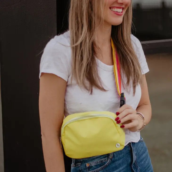 Yellow Solid Crossbody Fanny Pack wit complementary colors striped strap