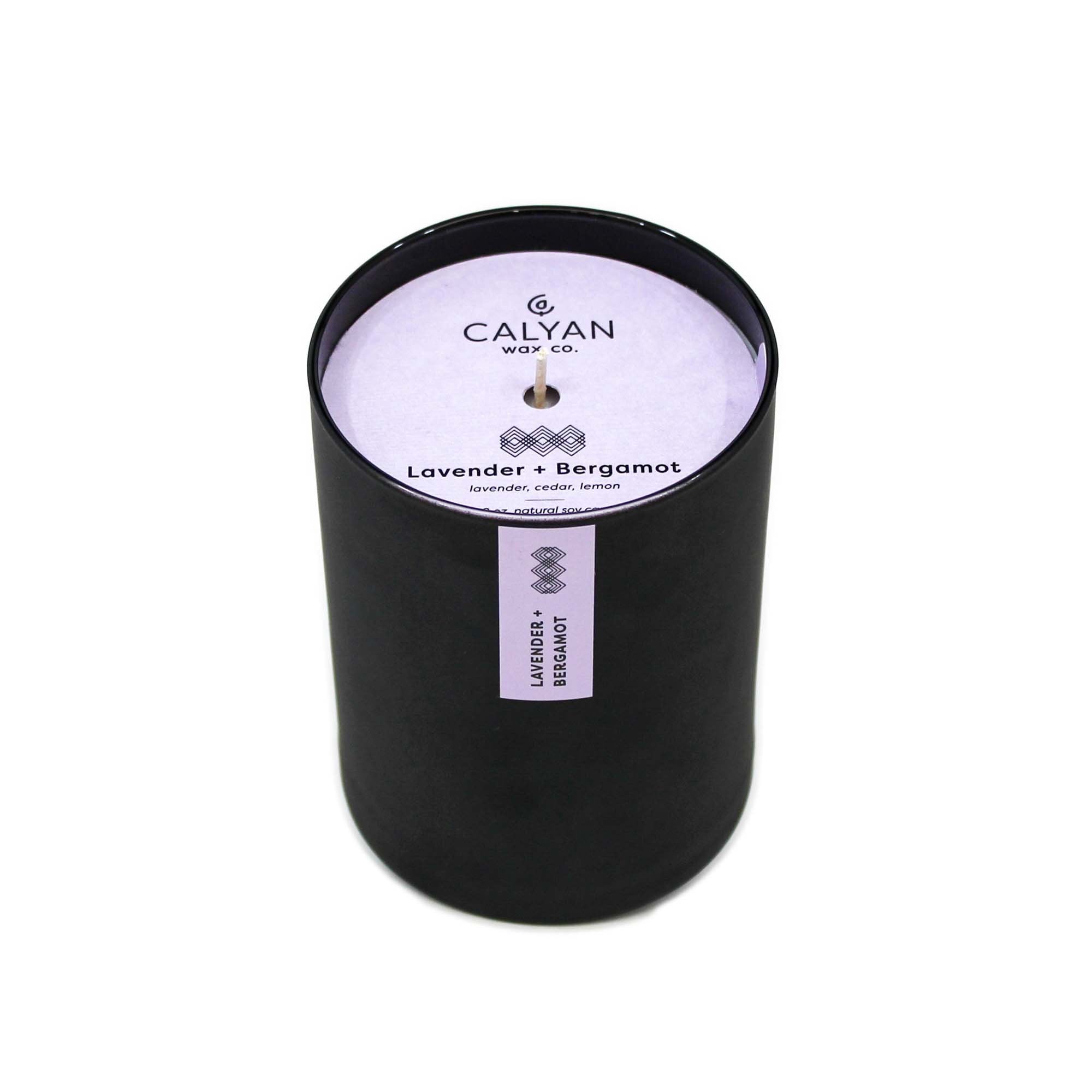 Collection of black matte glass tumbler candles from Calyan Wax Co.