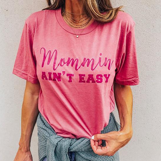 Mommin Ain&#39;t Easy women&#39;s t-shirt from Katydid with model wearing mauve color