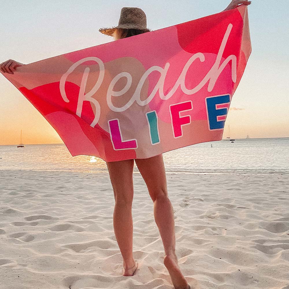Beach Life quick dry beach towel is super absorbent with model showing trendy design from Katydid